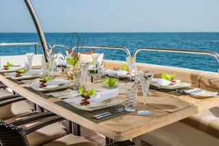 Dinning dining table from the top deck in luxurious boat