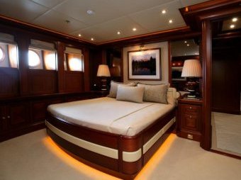 The yacht’s master bedroom in addition features a walk-in wardrobe and a spa. Image: Supplied