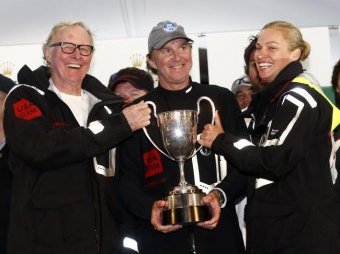 US billionaire Jim Clark along with his partner, Kristy Hinze with ship skipper Ken Read after Clark’s yacht the Comanche won the Sydney to Hobart Yacht Race in 2015. Picture: Kim Eiszele